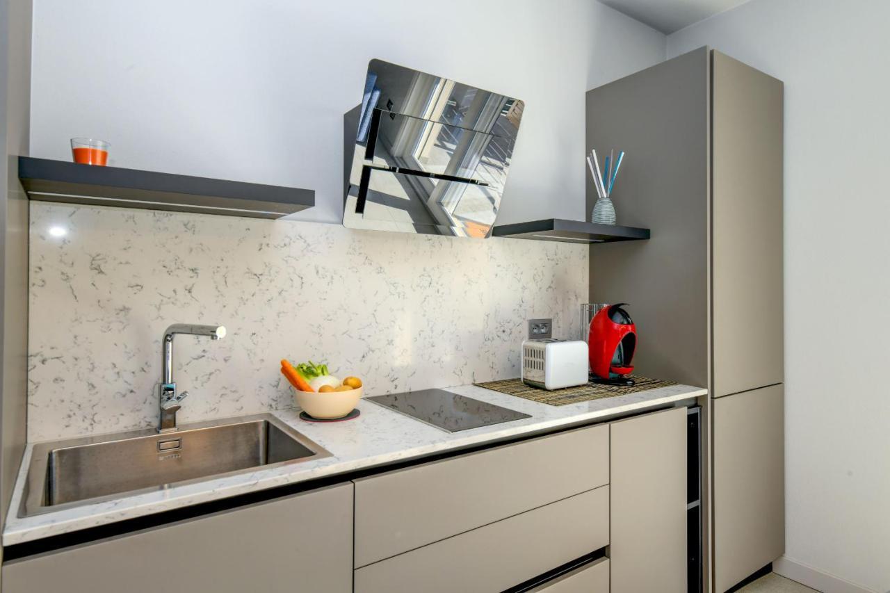 Rio Beach Apartment เดเซนซาโนเดลการ์ดา ภายนอก รูปภาพ